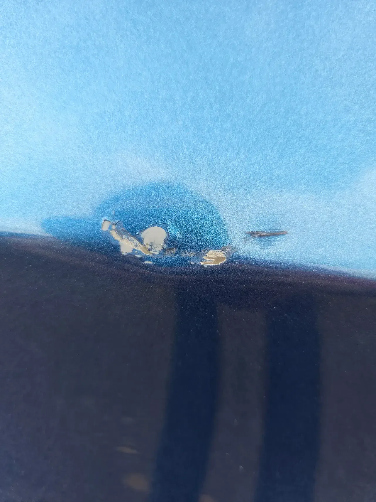 Before: blue car door with paint damage, then fully repaired